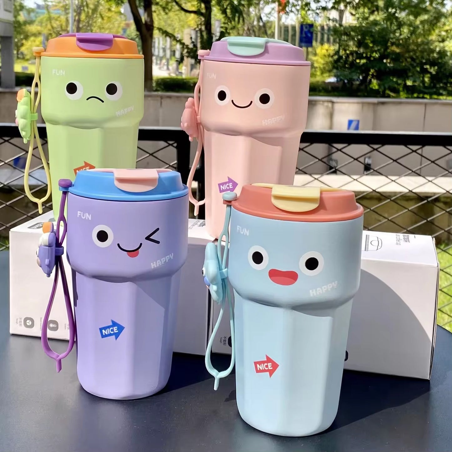 Sipper bottle collection with a smiley face design