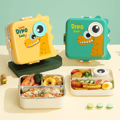 Bright yellow Baby Dino Double Decker Stainless Steel Kids Bento Box with cute dinosaur print. Features two stackable tiers, three leakproof compartments, and a snap-lock lid with matching stainless steel spoon. Perfect for tiffin box needs, school lunch, eco-friendly meal prep, travel food storage, and portion control for toddlers.